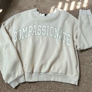 H&M Compassionate beige sweatshirt | Size Large | Excellent Condition